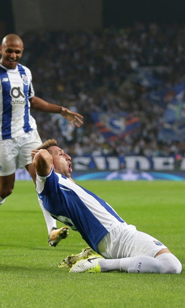 Porto beats Leipzig 3-1 to move 2nd in CL group